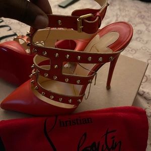 Red/orange brand new authentic Christian Loubou